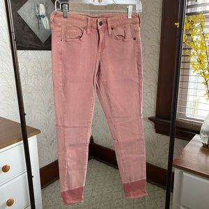 Distressed ombré skinny jeans